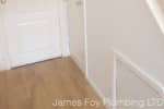 Understairs cupboard converted into a bathroom.